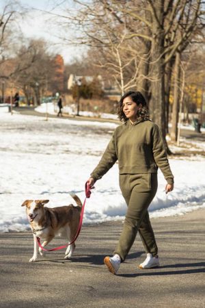 Photo of women walking a dog